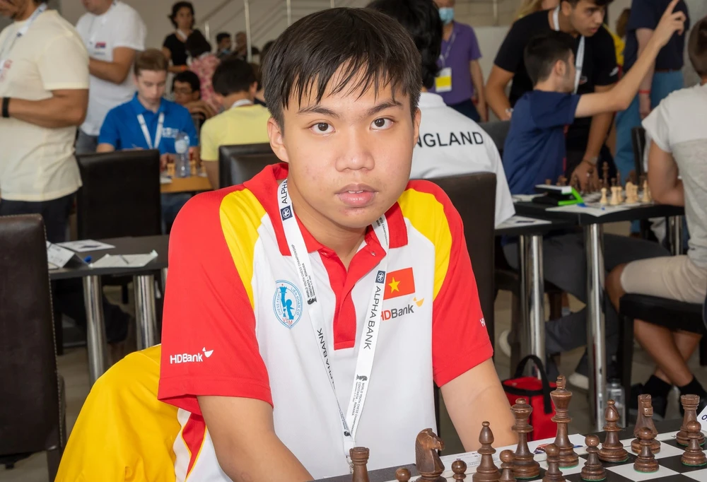 Nguyễn Quốc Hy thi đấu cờ vua